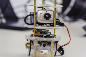Small robotic device with a camera, representing computer science research